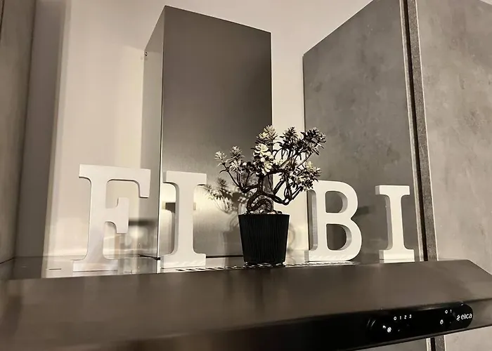 Attico Con Terrazzo Fibi Апартаменты *